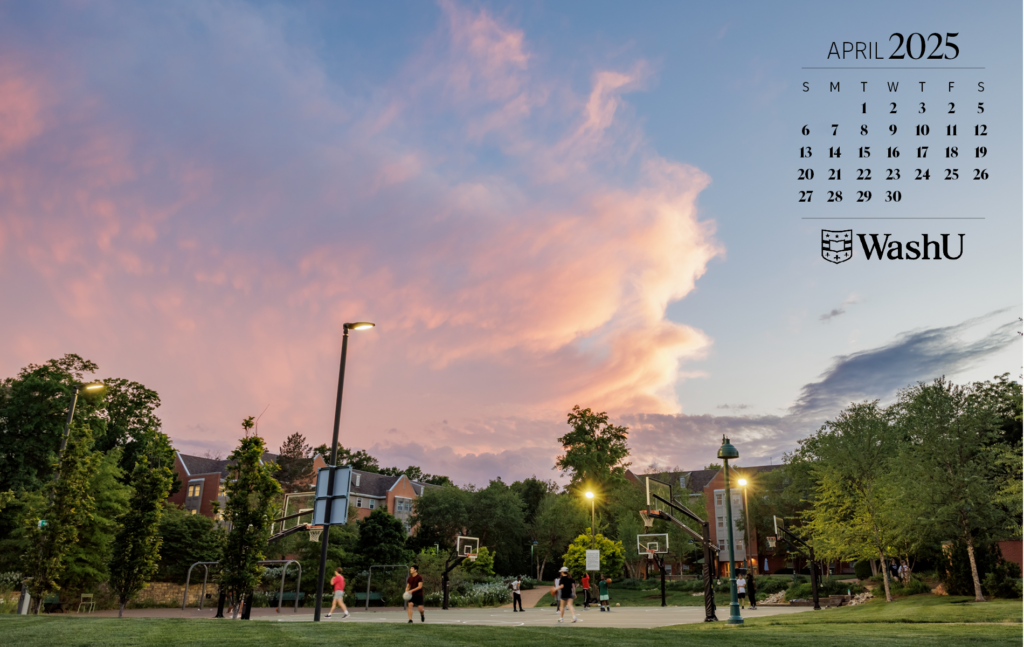 Students playing on basketball court on South 40