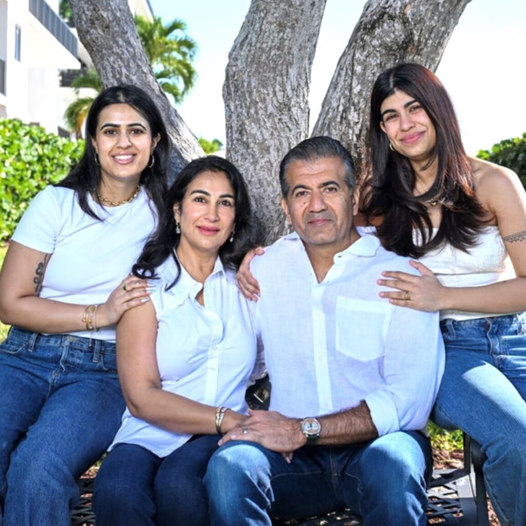 Sandeep Chugani and Anju Chugani with daughters Simi and Serina.