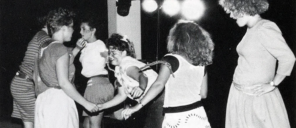 students dance during orientation in 1984