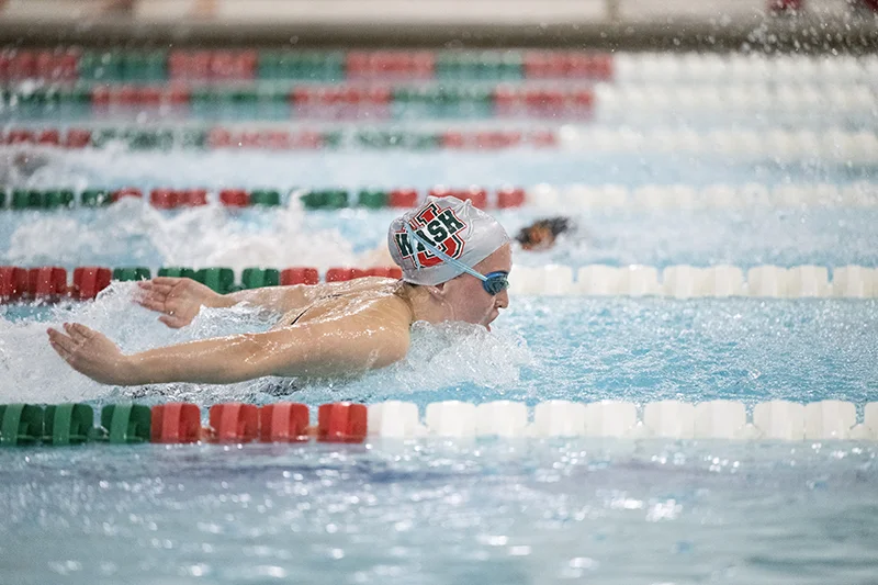 a WashU female swimmer doing the butterfly